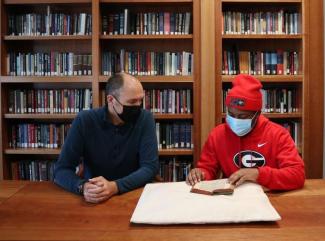 Photo of Ben Ehlers and studnet Gabriell Smallwood courtesy of Special Collections Library