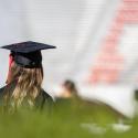 photo of anonymous student in cap and gown at UGA